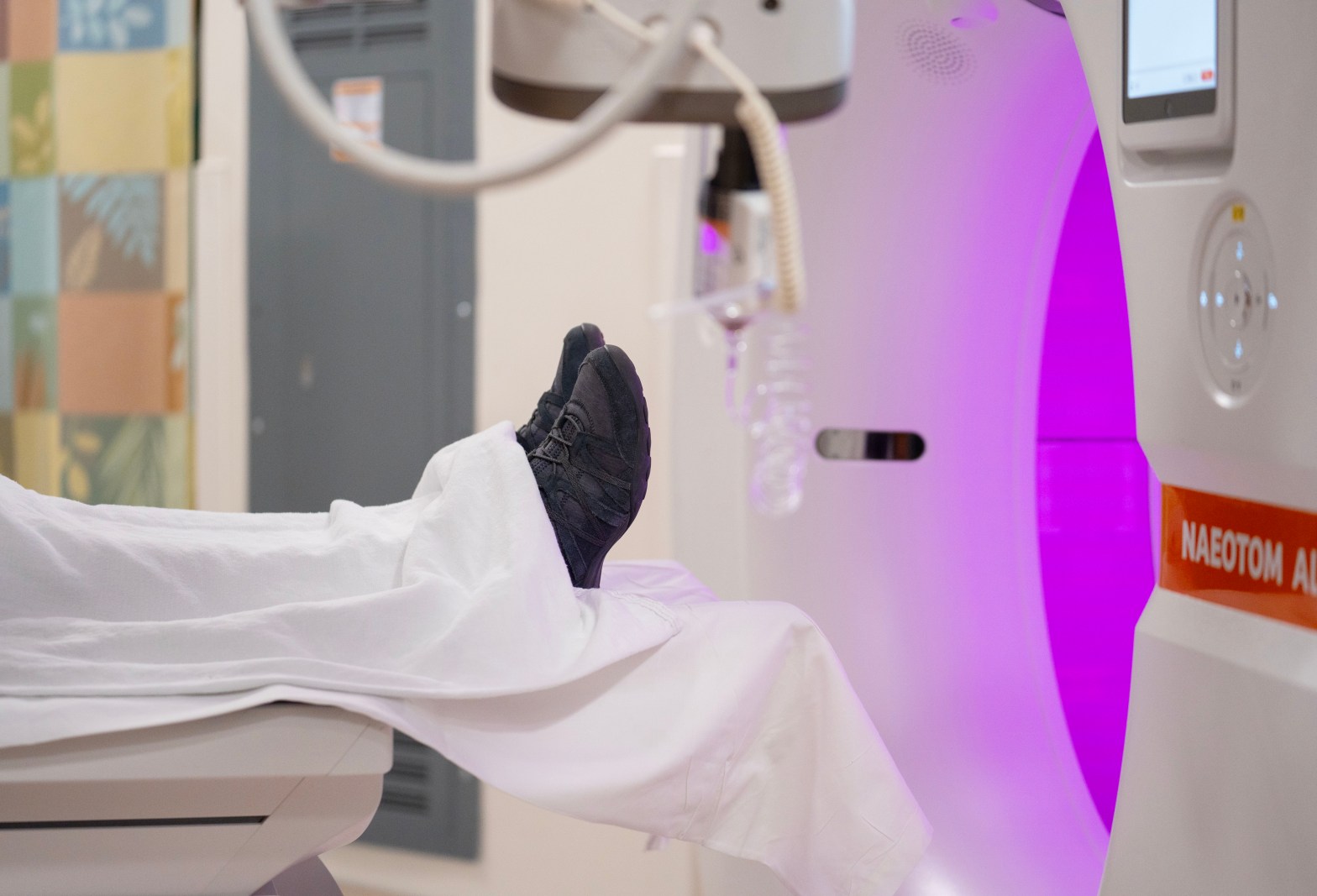 feet by a CT machine