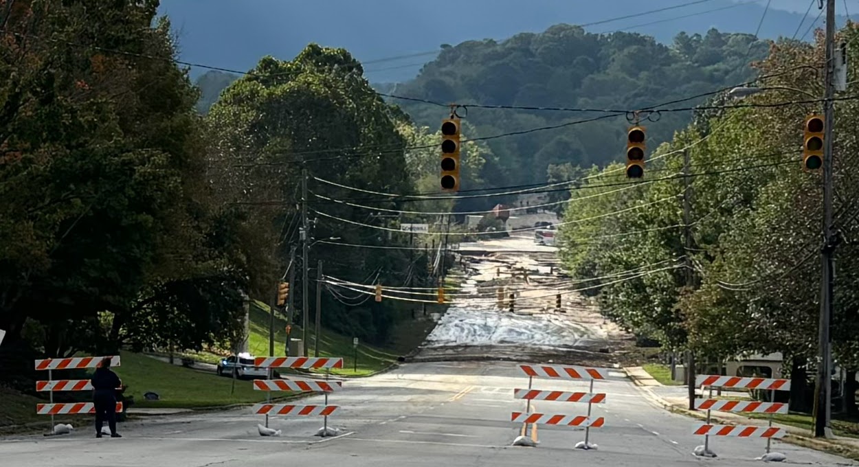 Flooding from Hurricane Helene covers Swannanoa River Road.
