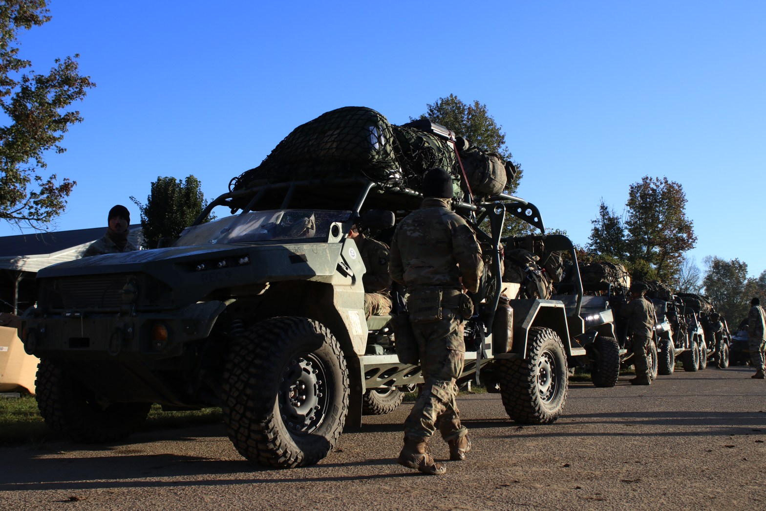 row of army trucks