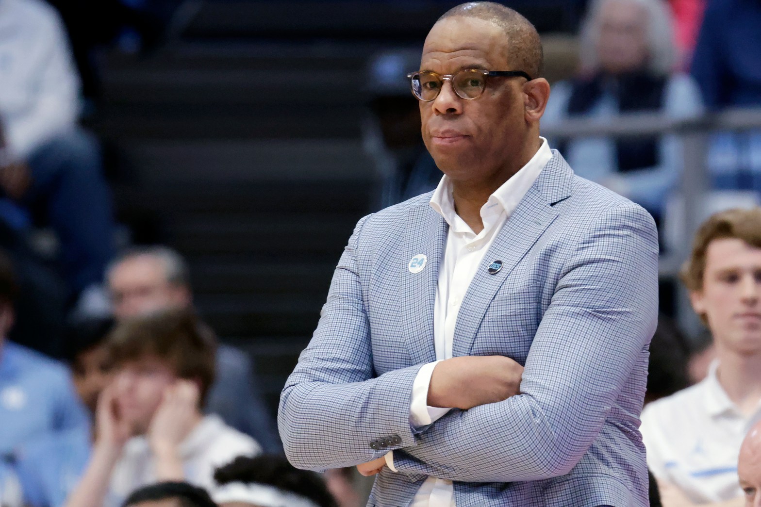 hubert davis in a blazer with arms crossed